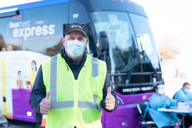 bus-exterior-masked-driver-thumbs-up